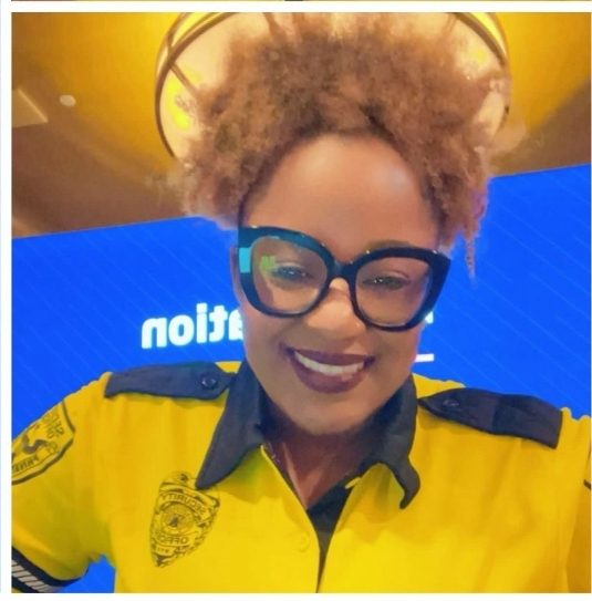Virgor staff member in a yellow uniform shirt